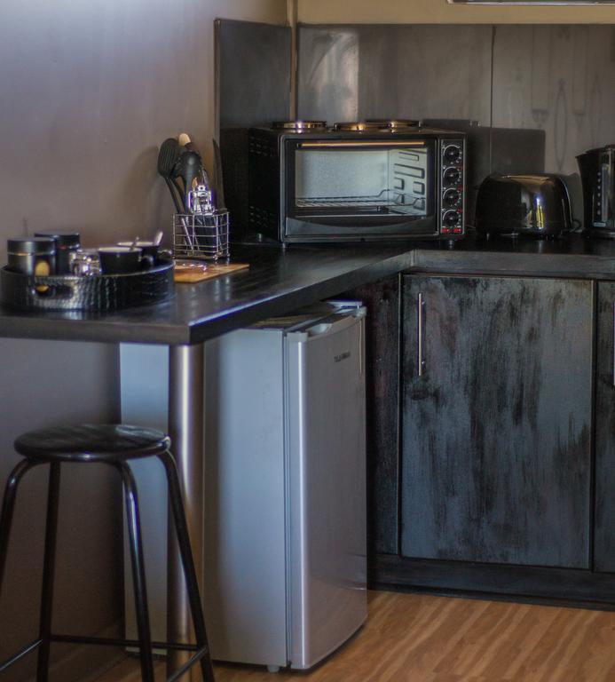 Altissimo Guesthouse Блоемфонтейн Стая снимка